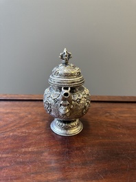 A fine Tibetan silver plated 'bajixiang' teapot, 19th C.