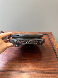 A Chinese blue and white 'lotus scroll' jar with wooden cover and stand, Kangxi