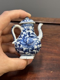 Two Chinese blue and white vases, two miniature jugs and a tea caddy, Kangxi