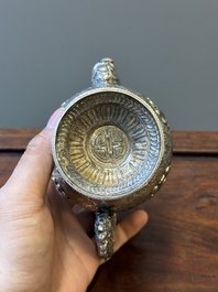 A fine Tibetan silver plated 'bajixiang' teapot, 19th C.