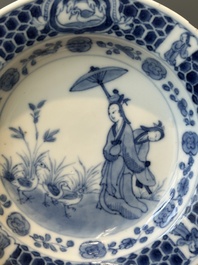 A Chinese blue and white 'Parasol ladies' plate after Cornelis Pronk, Qianlong