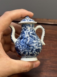 Two Chinese blue and white vases, two miniature jugs and a tea caddy, Kangxi