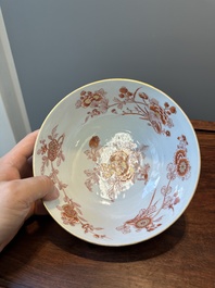 A pair of Chinese iron-red-decorated and gilt bowls with relief design, Kangxi