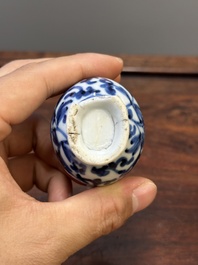 Two Chinese blue and white vases, two miniature jugs and a tea caddy, Kangxi