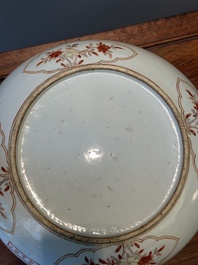 A Chinese wucai dish with figural and floral design, Jiajing mark, Transitional period