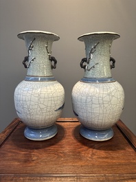 A pair of Chinese blue and white Nanking crackle-glazed 'Taoist' vases, 19th C.