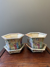 A pair of hexagonal Chinese Canton famille rose jardinieres on stands, 19th C.
