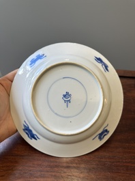 A pair of Chinese blue and white 'Buddhist lion' plates, ding mark, Kangxi