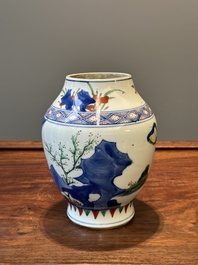 A Chinese wucai vase with figures and calligraphy, Transitional period