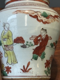 A pair of small Chinese wucai jars with figures in a landscape, Transitional period