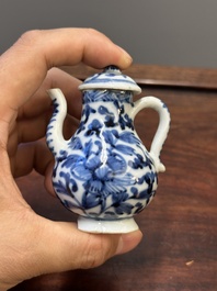 Two Chinese blue and white vases, two miniature jugs and a tea caddy, Kangxi