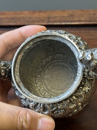 A fine Tibetan silver plated 'bajixiang' teapot, 19th C.