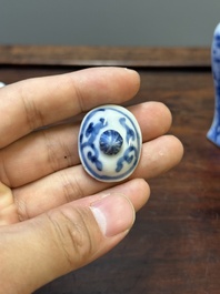 Two Chinese blue and white vases, two miniature jugs and a tea caddy, Kangxi