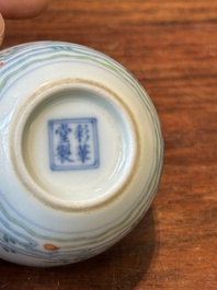 A Chinese doucai 'goldfish' cup, Cai Hua Tang Zhi 彩華堂製 mark, 18th C.