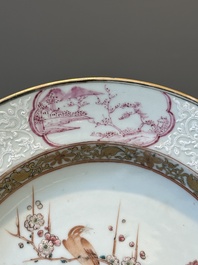 A pair of Chinese famille rose 'magpie and peony' plates with bianco-sopra-bianco rims, Yongzheng