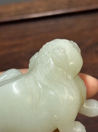 A fine Chinese celadon jade sculpture of a mythical beast, 17/18th C.