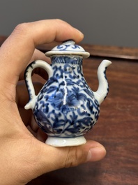 Two Chinese blue and white vases, two miniature jugs and a tea caddy, Kangxi