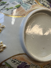 A Chinese Canton famille rose covered bowl and a matching plate, 19th C.