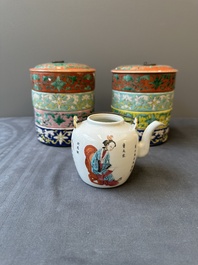 A pair of Chinese famille rose four-tier stacking boxes and a teapot, 19th C.