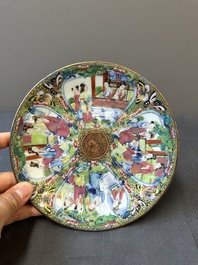 A pair of Chinese blue and white Canton-decorated plates, a famille rose 'playing boys' plate and a reticulated plate, 19th C.