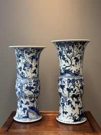 Two Chinese blue and white 'gu' vases with squirrels among grape vines, Kangxi