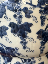 Two Chinese blue and white 'gu' vases with squirrels among grape vines, Kangxi