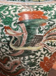 A pair of Chinese wucai 'phoenix and peony scroll' vases, Transitional period