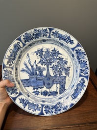 A Chinese blue and white 'antiquities' dish, Kangxi