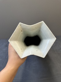 A Chinese blue and white double lozenge-shaped vase with a mountainous river landscape, 19th C.