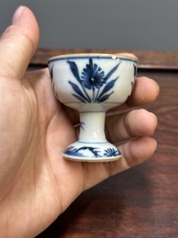 Two Chinese blue and white stem cups and four miniature 'gu' vases, Kangxi