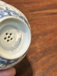 A rare Chinese reticulated double-walled blue and white cup, Kangxi