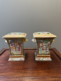 A pair of Chinese Canton famille rose bough pots and covers, 19th C.