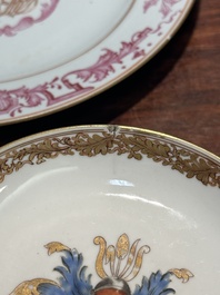 A pair of monogrammed Chinese puce-enamelled plates and a pair of armorial cups and saucers, Yongzheng/Qianlong