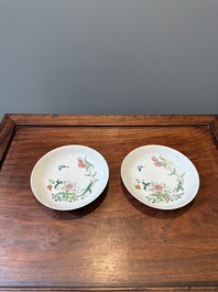 A pair of Chinese famille rose 'peony and butterfly' plates, Yongzheng/Qianlong