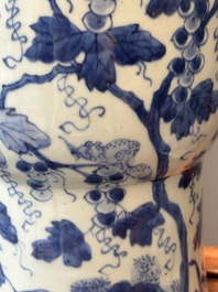 Two Chinese blue and white 'gu' vases with squirrels among grape vines, Kangxi