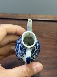 Two Chinese blue and white vases, two miniature jugs and a tea caddy, Kangxi