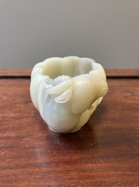 A Chinese celadon jade flower-shaped brush washer with ram's head, 17th C.