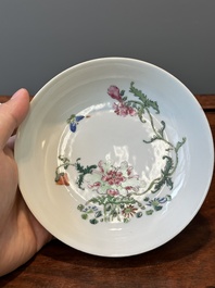 A pair of Chinese famille rose 'peony and butterfly' plates, Yongzheng/Qianlong