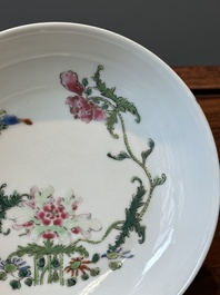 A pair of Chinese famille rose 'peony and butterfly' plates, Yongzheng/Qianlong