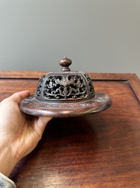 A Chinese blue and white 'lotus scroll' jar with wooden cover and stand, Kangxi