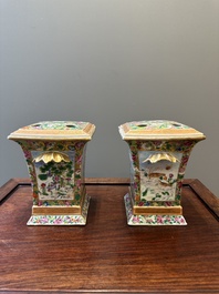 A pair of Chinese Canton famille rose bough pots and covers, 19th C.