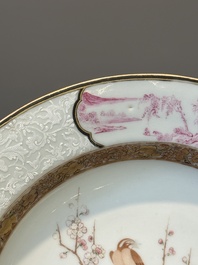 A pair of Chinese famille rose 'magpie and peony' plates with bianco-sopra-bianco rims, Yongzheng