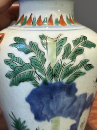 A small Chinese wucai jar with figures in a landscape, Transitional period