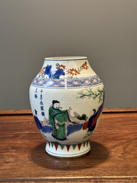 A Chinese wucai vase with figures and calligraphy, Transitional period