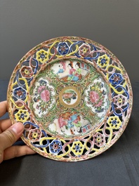 A pair of Chinese blue and white Canton-decorated plates, a famille rose 'playing boys' plate and a reticulated plate, 19th C.