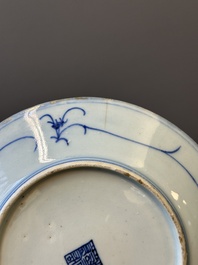 A pair of Chinese blue and white Canton-decorated plates, a famille rose 'playing boys' plate and a reticulated plate, 19th C.