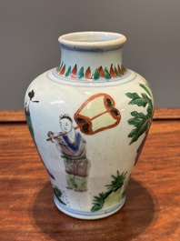 A small Chinese wucai jar with figures in a landscape, Transitional period