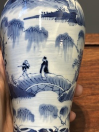 A Chinese blue and white garniture of five vases with landscape design, 19th C.