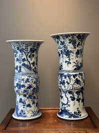 Two Chinese blue and white 'gu' vases with squirrels among grape vines, Kangxi