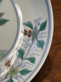 A Chinese doucai plate with pomegranates, plums and grapes, Chenghua mark, Kangxi